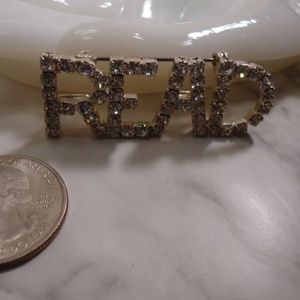 "READ" pin brooch